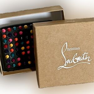 Christian Louboutin Multicolor Studded
Patent Leather Bifold card case holder